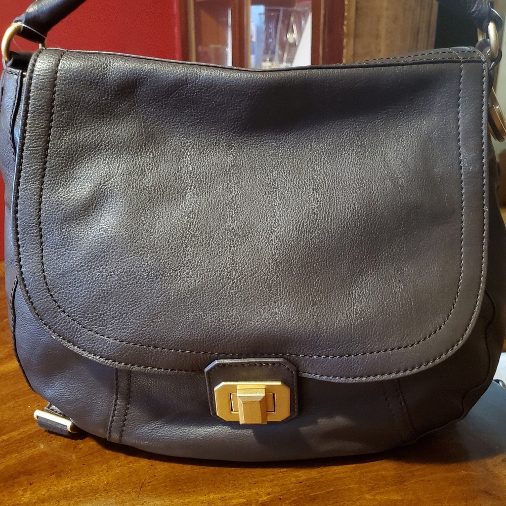 Juicy Couture Dark Brown Leather hobo convertible backpack.
